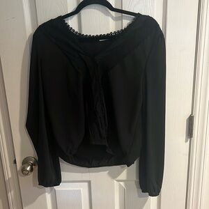 Black blouse from Francesca’s, runs small